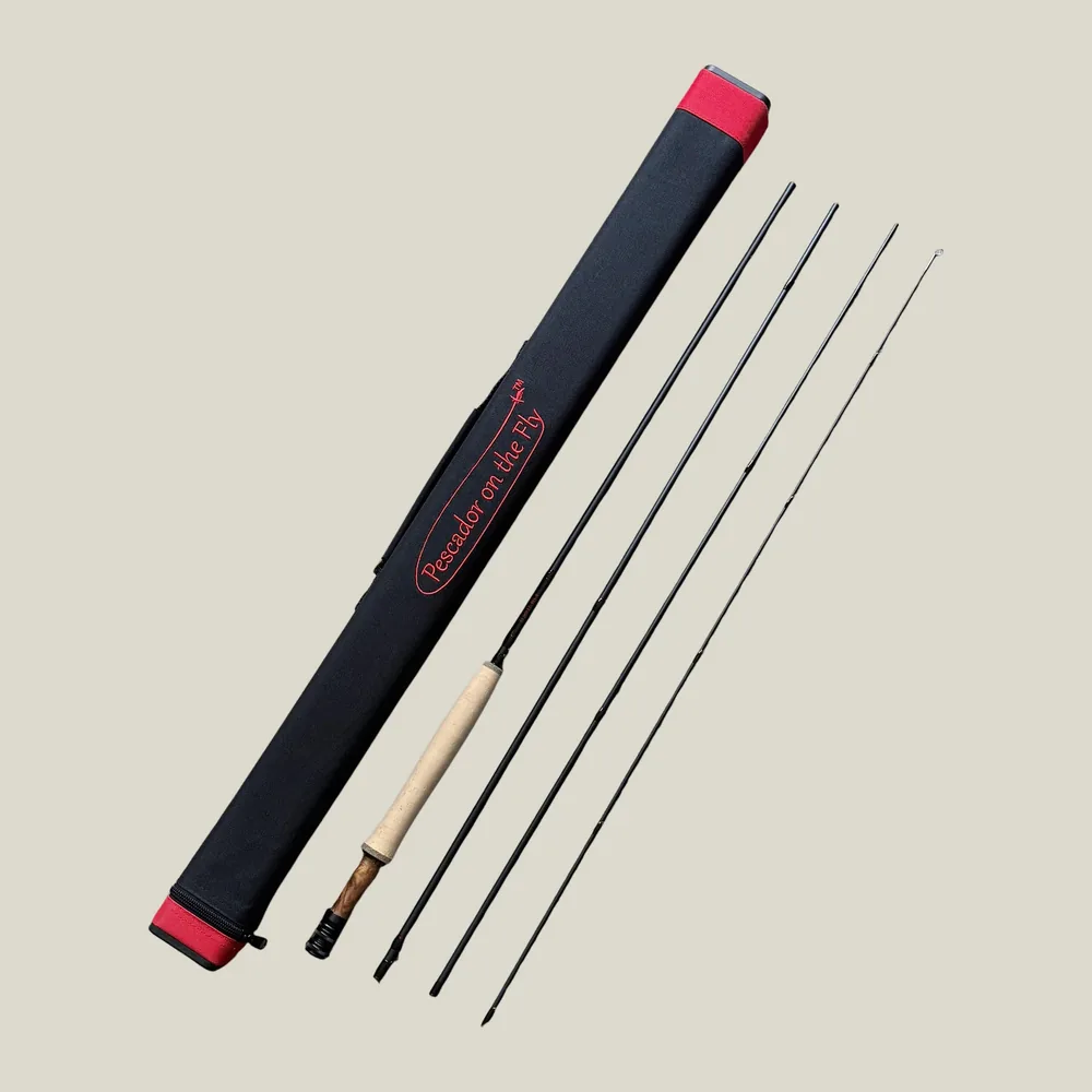 The El Jefe v2 broken into its four sections beside the black Cordura square tube with red end caps and red Pescador on the Fly script, on a plain warm grey background.